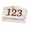 House number plaque with street name. Rectangular sign featuring number 123 and text: ul. Very Long Name.