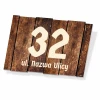 Rectangular house sign with wooden background, featuring large numbers and street name design.