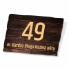House plaque with address and property number - Rectangular shape, wood-like background, large number 49.