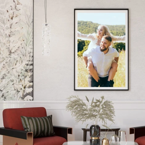 Photo poster 50x70 cm - Living room arrangement with light walls and furniture in shades of red and green.