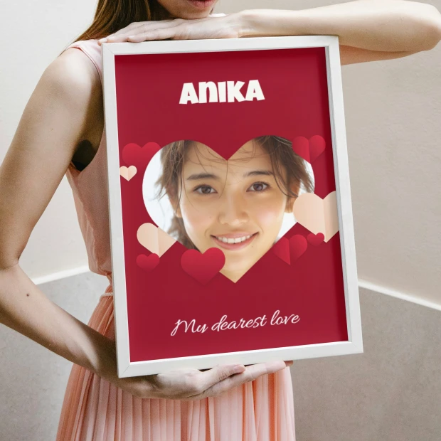 Photo poster 70x100 cm - Graphic design. Red background with hearts and a person\'s photo in a heart.