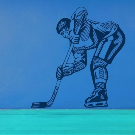 Dynamic hockey player sticker on a vibrant blue wall, perfect for a young athlete\'s room.