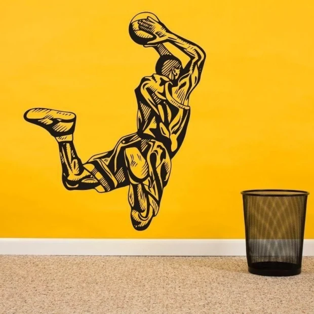Basketball player wall stencil 02 - Room setup. Yellow wall featuring a jumping basketball player graphic.