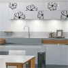 Elegant klasik 115 sticker in a modern kitchen, adding lightness and style with black flowers.