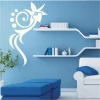 Stylish floral sticker 051 in a modern living room, perfect for brightening up a blue wall.