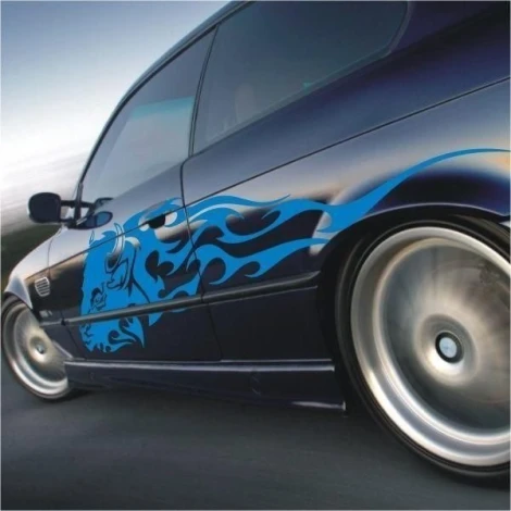 Dynamic bull sticker 09 with blue flames, perfect for decorating a sports car and enhancing its look.