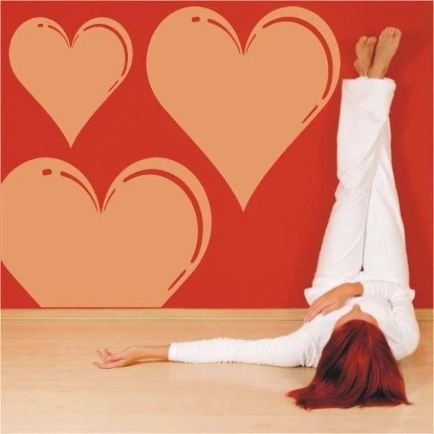 Heart sticker 1013 in warm shades on a wall in a cozy room, adding romance and style.