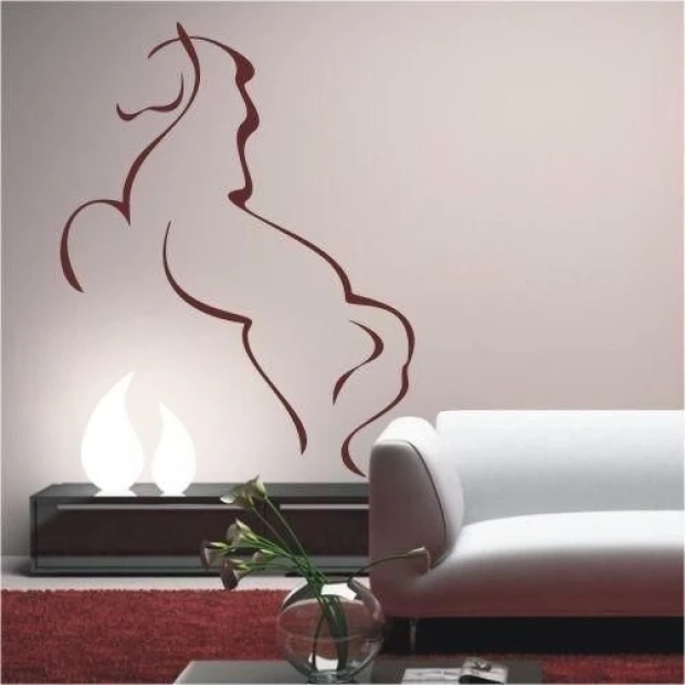 Elegant horse wall sticker in a modern living room, adding character and style.