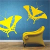 Bright butterfly sticker 011 in cheerful colors, perfect for a child\'s room, adding a joyful touch.