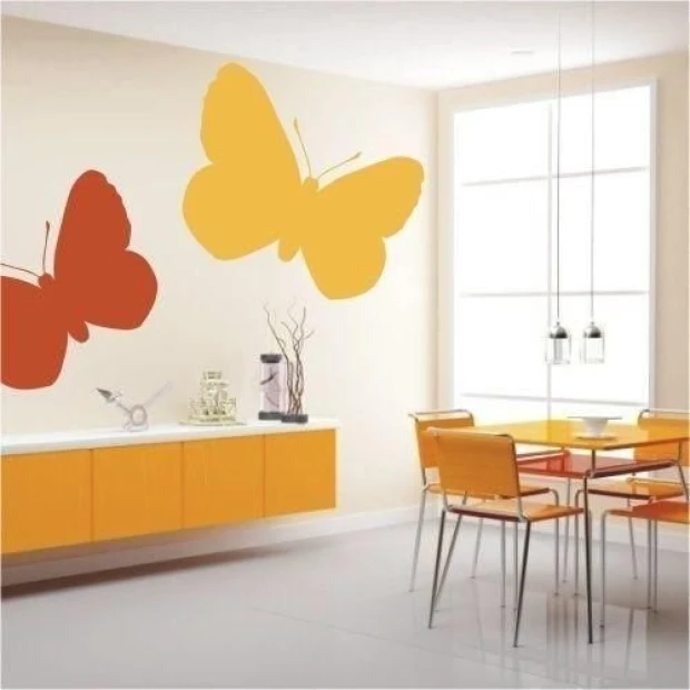 Colorful butterfly stickers 021 energize a modern dining room, harmonizing with light furniture.