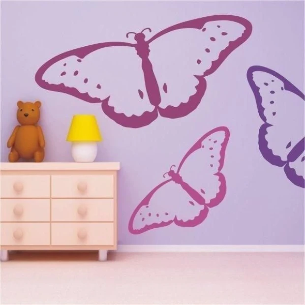 Colorful butterfly patterns in a pastel children\'s room, adding joy and lightness to the space.