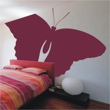 Stylish butterfly sticker 022 in burgundy shades, perfect for a modern bedroom, adding character.