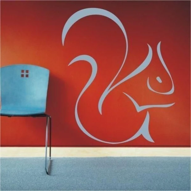 Stylish squirrel sticker on a vibrant red wall, perfect for modern interiors.