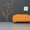 Stylish animal sticker 25 in a modern living room, adding energy with vibrant orange color.