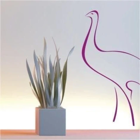 Elegant animal sticker in a minimalist interior, adding character to a wall with soft lighting.