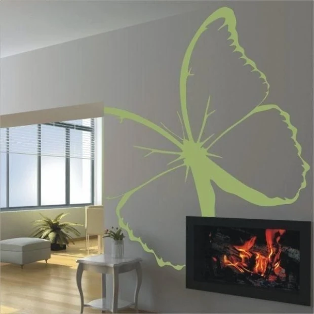 Butterfly 005 in an energetic lime shade beautifully enlivens a modern living room with a fireplace and large windows.