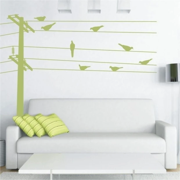 Bird painting stencil 1067 - Living room setup with light walls, white sofa, and striped cushions.