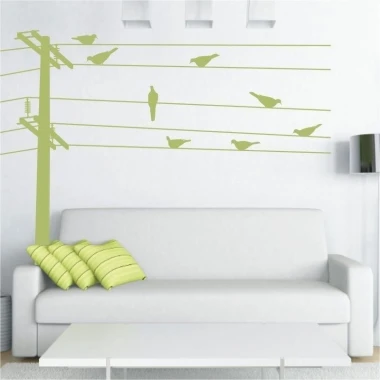 Bird painting stencil 1067 - Living room setup with light walls, white sofa, and striped cushions.