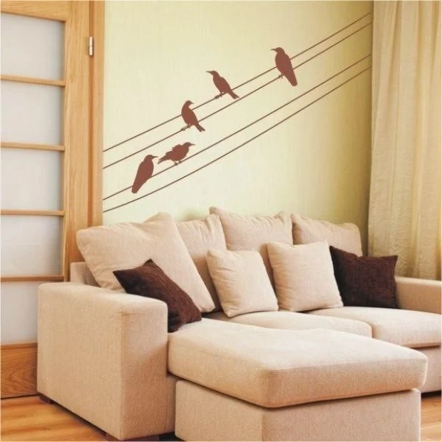 Bird painting template 1066 - Living room arrangement with light-colored walls and beige furniture.