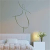 Painting template lady 43 - Bedroom arrangement with light-colored walls, minimalist furniture, and a bedside lamp.