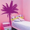 Stylish palm in vibrant purple, adding energy to a pink children\'s bedroom.