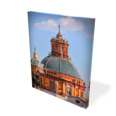 Canvas print from a photo 40x60 cm - Urban space arrangement. Building with a colorful dome and details.