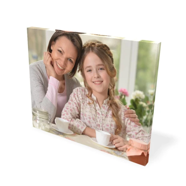 Canvas print 60x75 cm - Kitchen decor. Light walls, table with cups, flowers in the background.