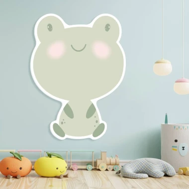 Magnetic dry-erase frog board for kids, styled in a bright children\'s room with light walls and flooring.
