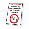 No cycling or scooters allowed on school grounds - Graphic design. Red circle with bike icon on a white background.