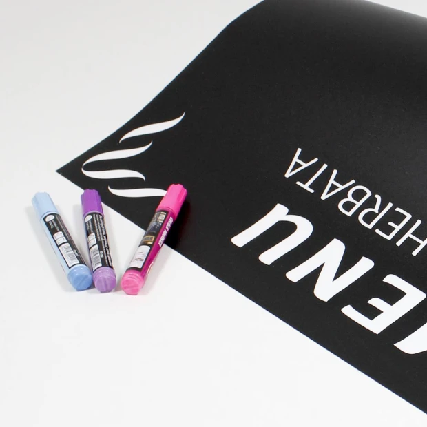 Custom chalkboard film - Graphic design. Black material with white text and colorful markers.
