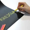 Chalkboard film - black - Graphic design. Hand writing with chalk on a black surface.