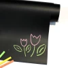 Chalkboard film - black - featuring a graphic design of pink and green flowers.