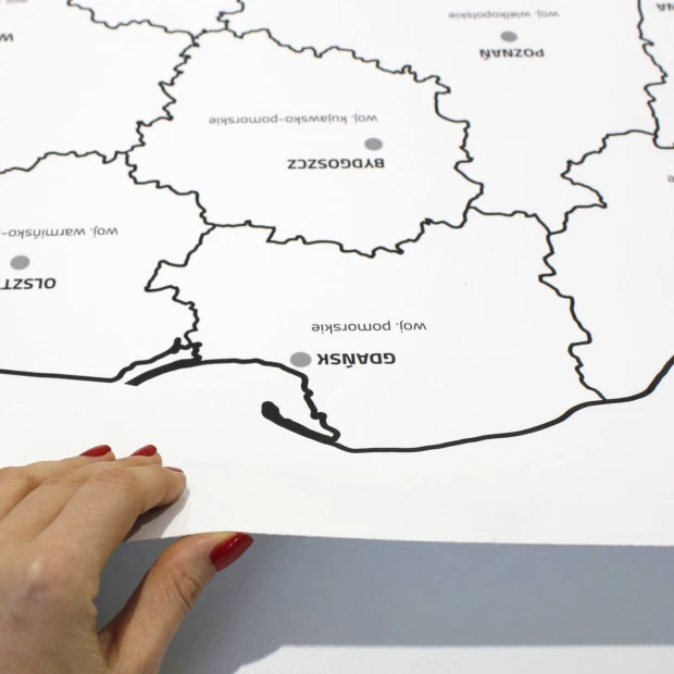 Dry-erase chalkboard film with custom print - Graphic design featuring black map outlines and place names on white.
