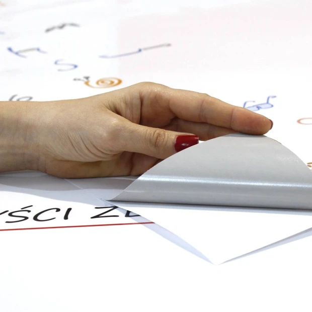 Dry-erase chalkboard film with custom print - Graphic design featuring colorful text and symbols on a white background.