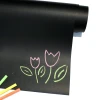 Chalkboard film - black - featuring a graphic design of pink and green flowers.