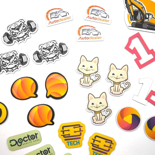 Custom printed magnetic mat - Graphic design. Includes various stickers with characters, texts, and shapes.