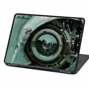 Laptop sticker P538 - Optical sensor design featuring a round object with metallic details.