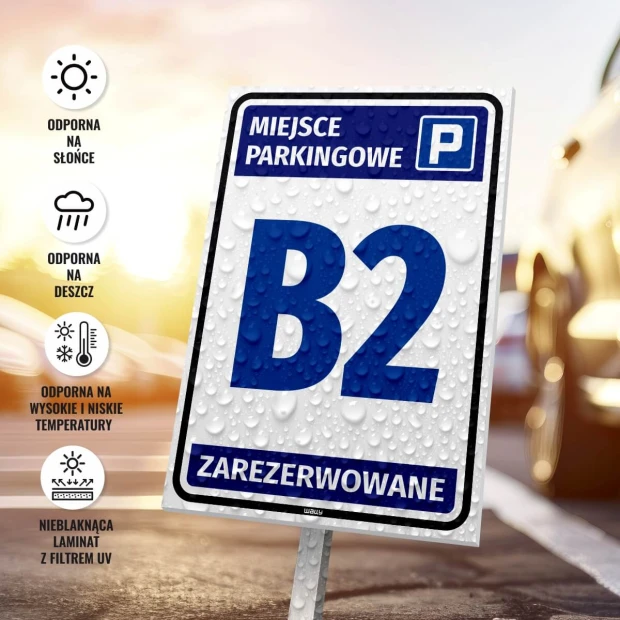 Reserved parking sign with number, featuring a graphic design. Blue text on a white background.