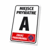 Private area sign, no parking, with number and graphic design - simple rectangle with large letters.