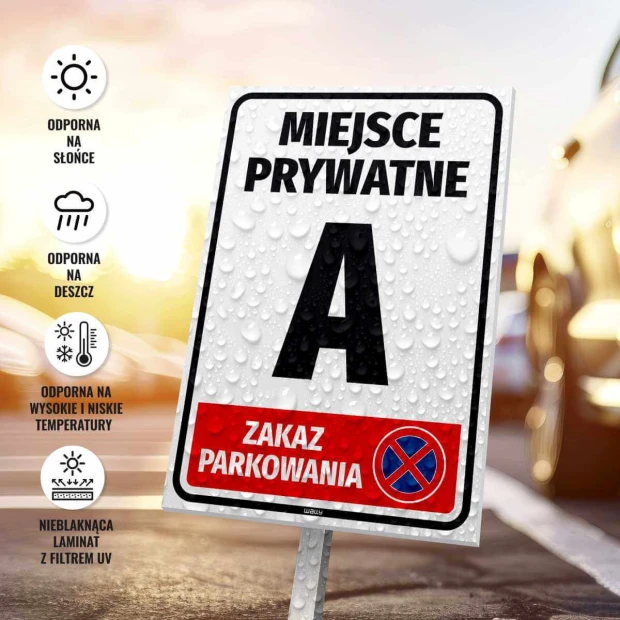 Private area sign, no parking, with number and graphic design. Simple sign with a white background.