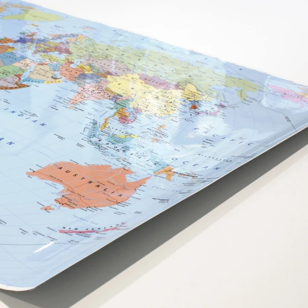 Magnetic dry-erase film with custom print - World map design featuring continents in various colors.