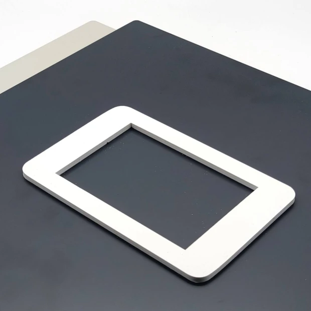 Engraved address plaque in brushed silver-black dibond, 42 x 35 cm, featuring a simple rectangular design.