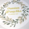 Custom large wall sticker - Graphic design. Round motif with green leaves and gold lettering.