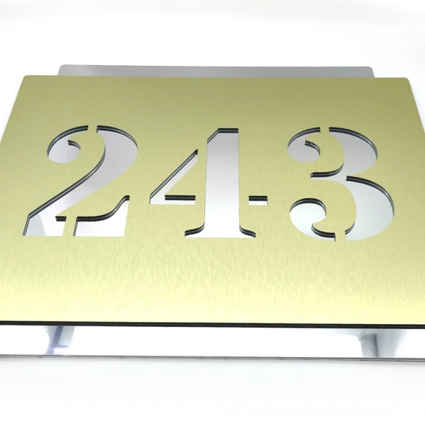 Engraved dibond number plaque 42 x 35 cm gold-silver brushed - Graphic design. Numbers 243 cut in gold.