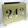 Engraved dibond number plaque 42 x 35 cm in brushed gold-silver with graphic design. Gold numbers 243 cut out.