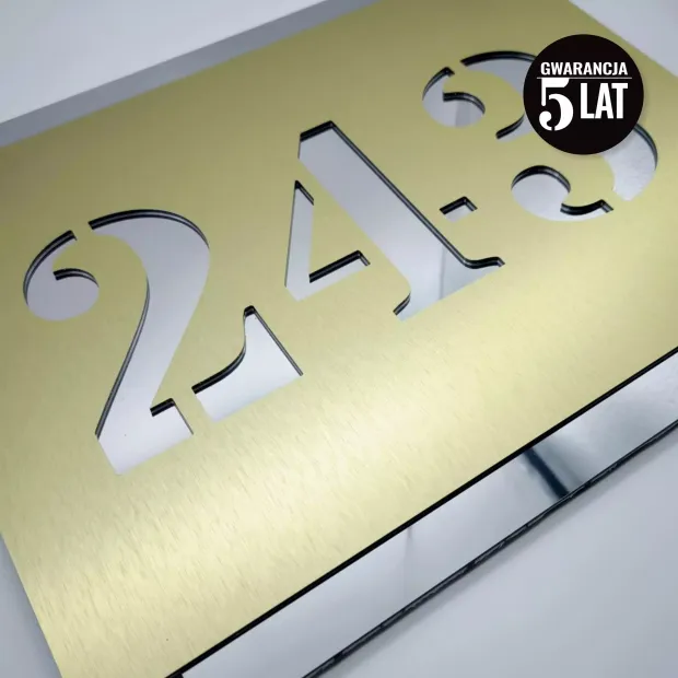 Engraved dibond number plaque 42 x 35 cm in brushed gold-silver with gold cut-out digits.
