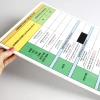 A3 dry-erase board with a graphic design. Simple table featuring colorful sections and text in various colors.