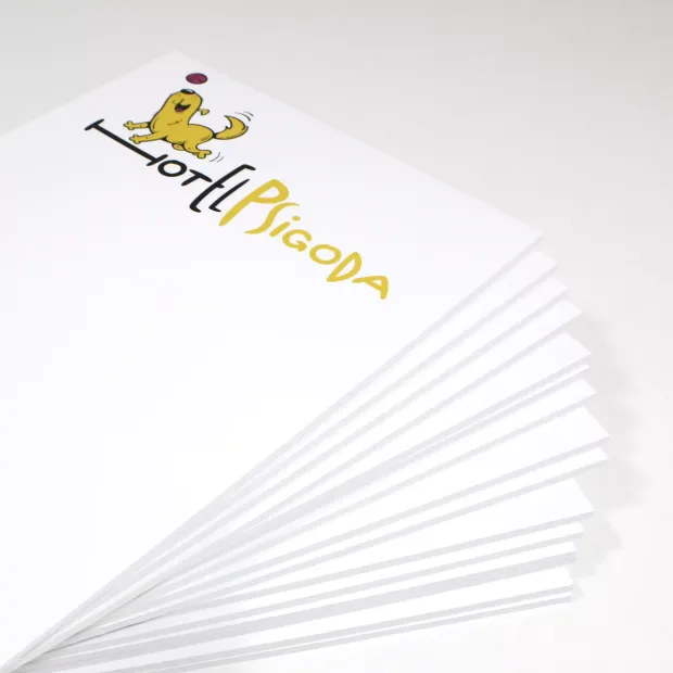 A5 dry-erase board with a graphic design featuring a dog and yellow text.