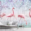 Children\'s wallpaper with pink flamingos on a leaf and grass background. Bright modern living room decor.