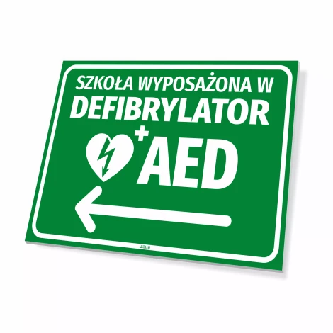 Safety sign: School equipped with AED defibrillator, left arrow - Graphic design. Green background, white text, symbol.